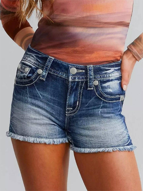 Front view of a lady wearing denim shorts