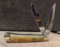 2 blade decorative knife with a light yellow pearl handle