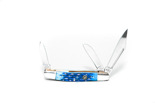 Pocket knife with blue and silver design on a white background