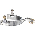 A polished stainless steel show spur with notched edge detailing, featuring a medium width band and free-swinging brass button.