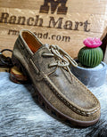 A brown Ferrini men's leather loafer placed on a surface with a cactus decoration in the background.