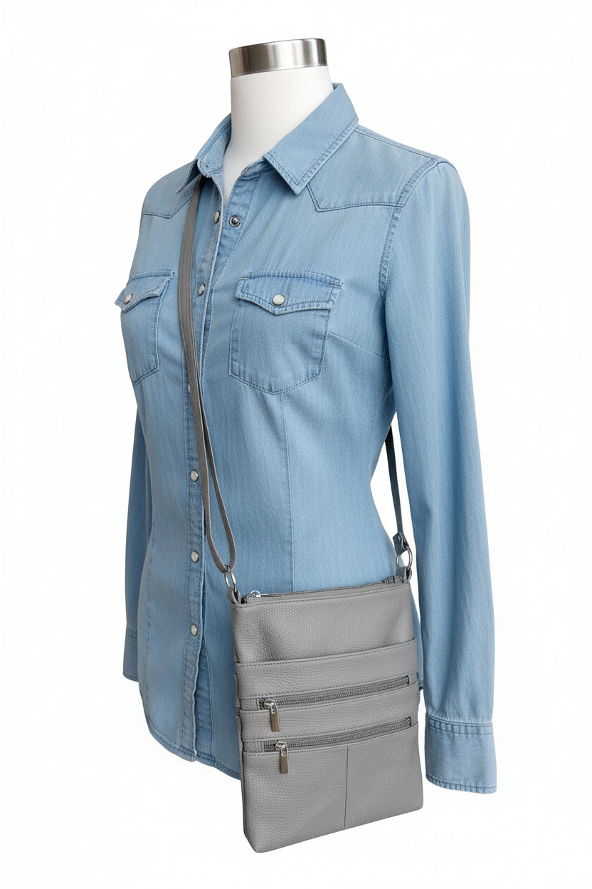 Gray crossbody bag on a mannequin with a white background