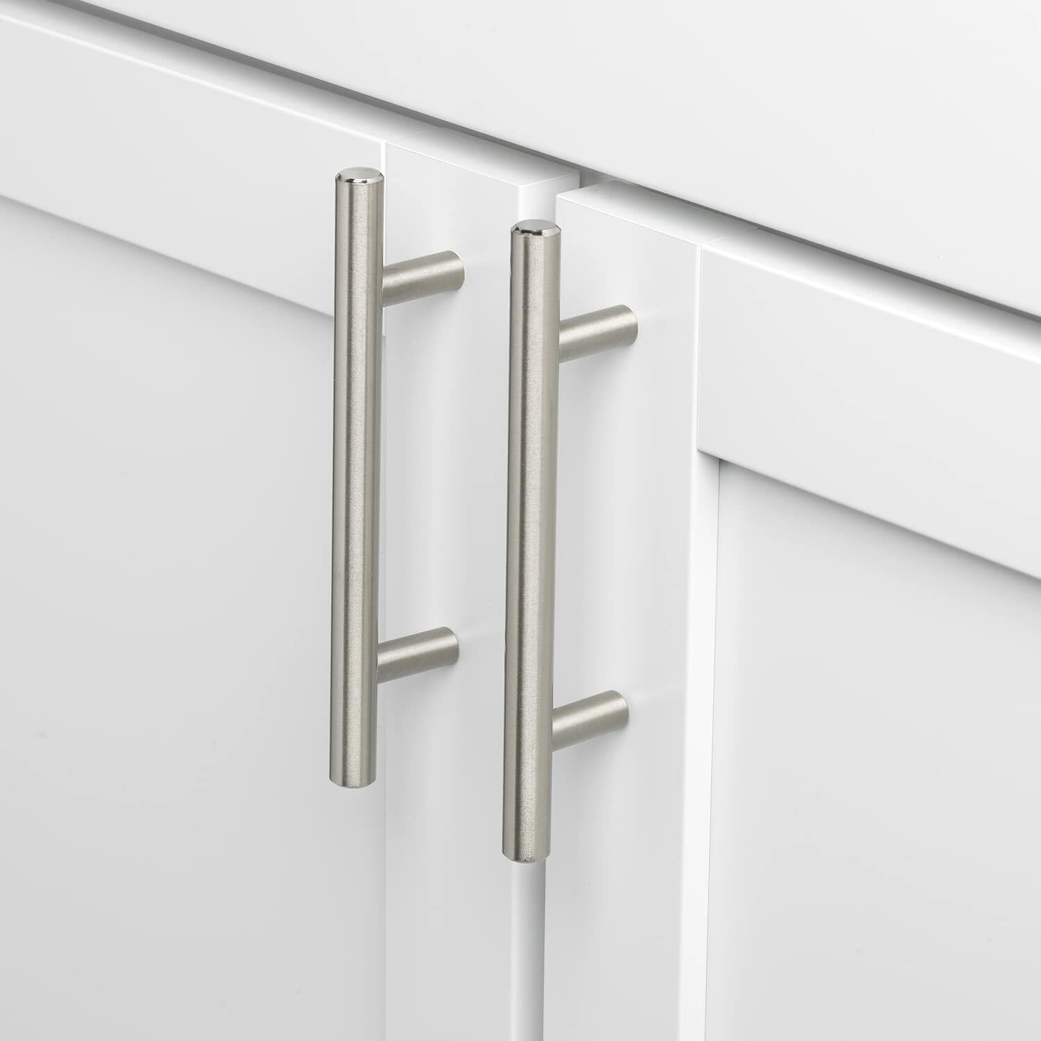 2 GlideRite Solid Handle Bar Pulls  on a white cabinet.
