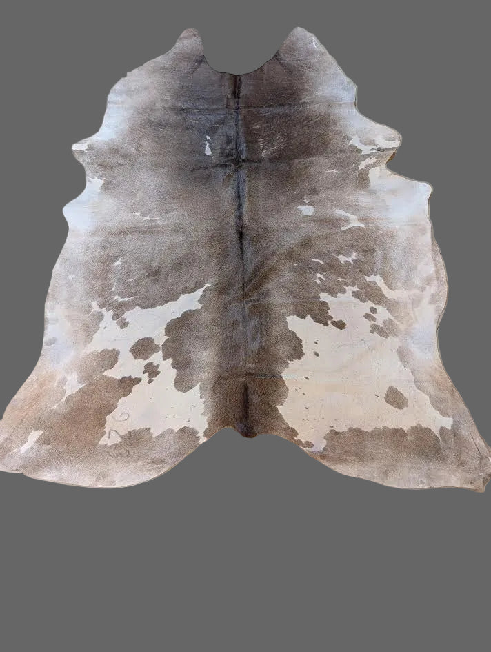 Cowhide rug with a gray background