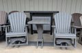 Outdoor furniture set with gray chairs and a table.