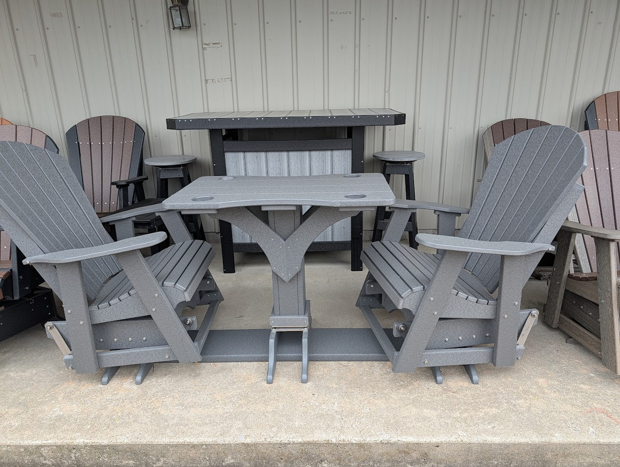 Outdoor furniture set with gray chairs and tables on a patio.