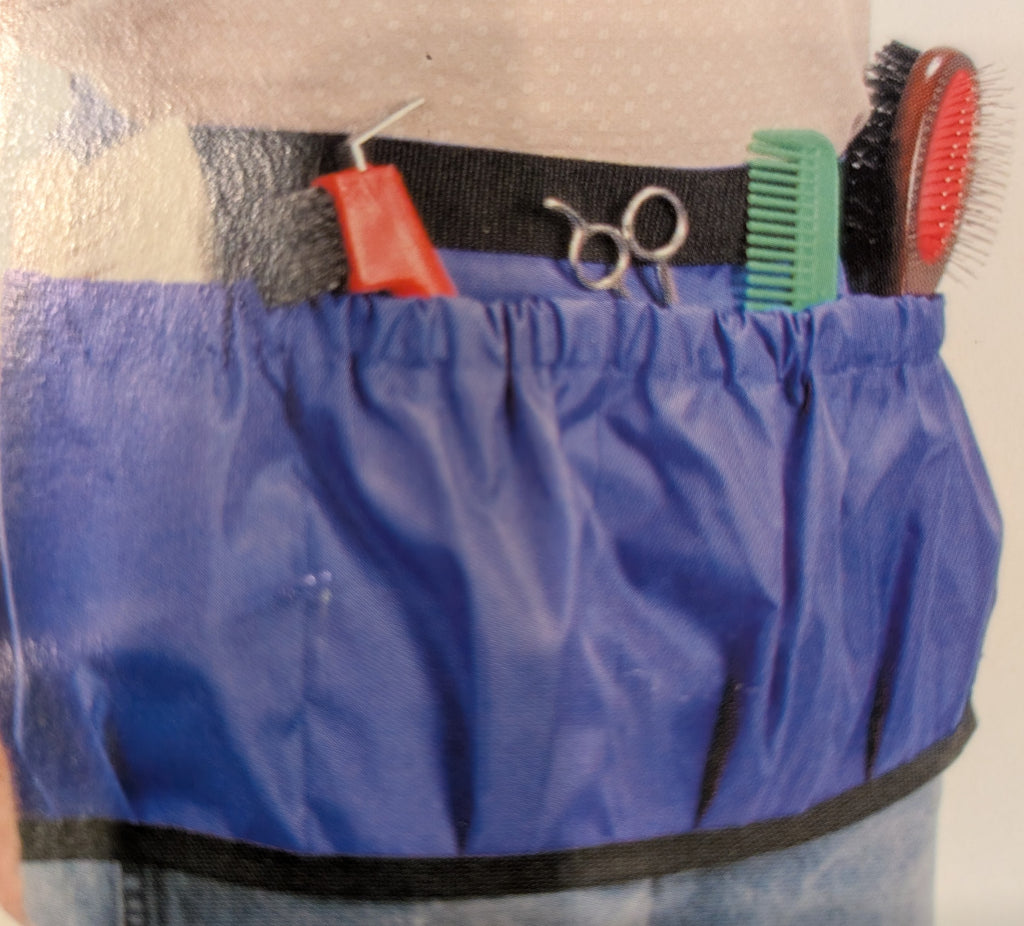 Belt for holding grooming supplies