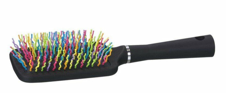 Black hairbrush with colorful bristles on a white background