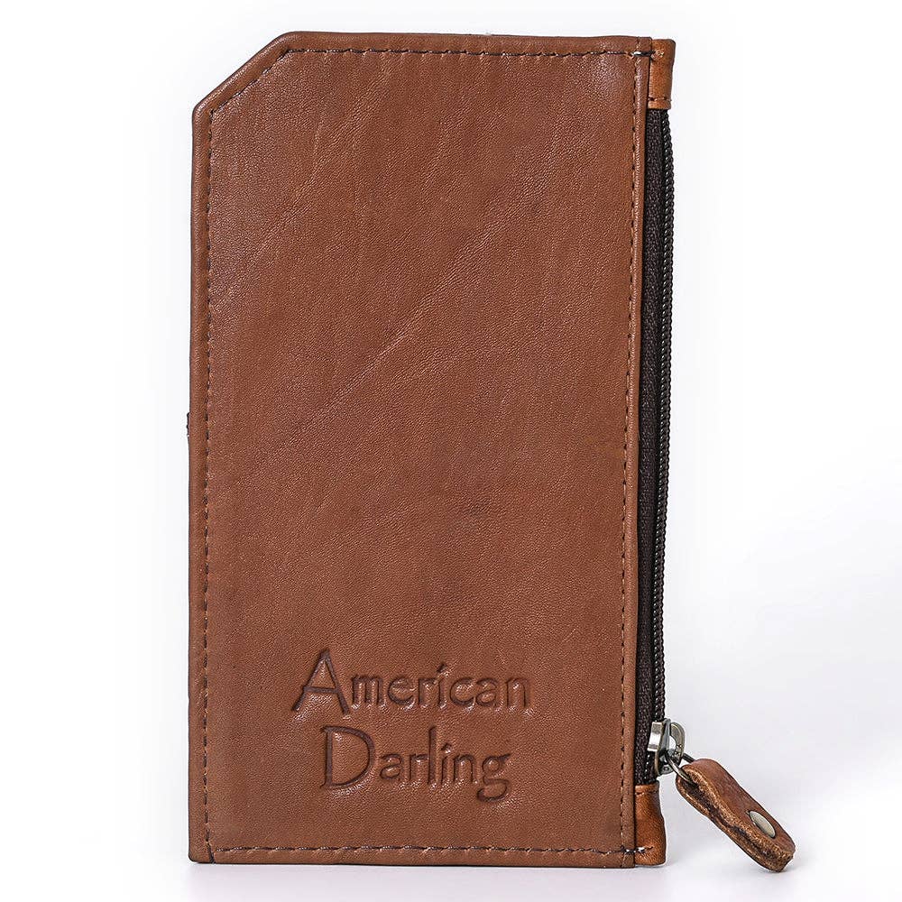 Brown leather wallet with 'American Darling' text on a white background