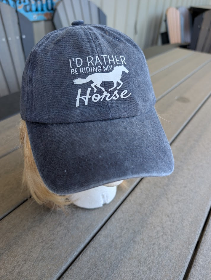 Blue cap with 'I'd Rather Be Riding My Horse'