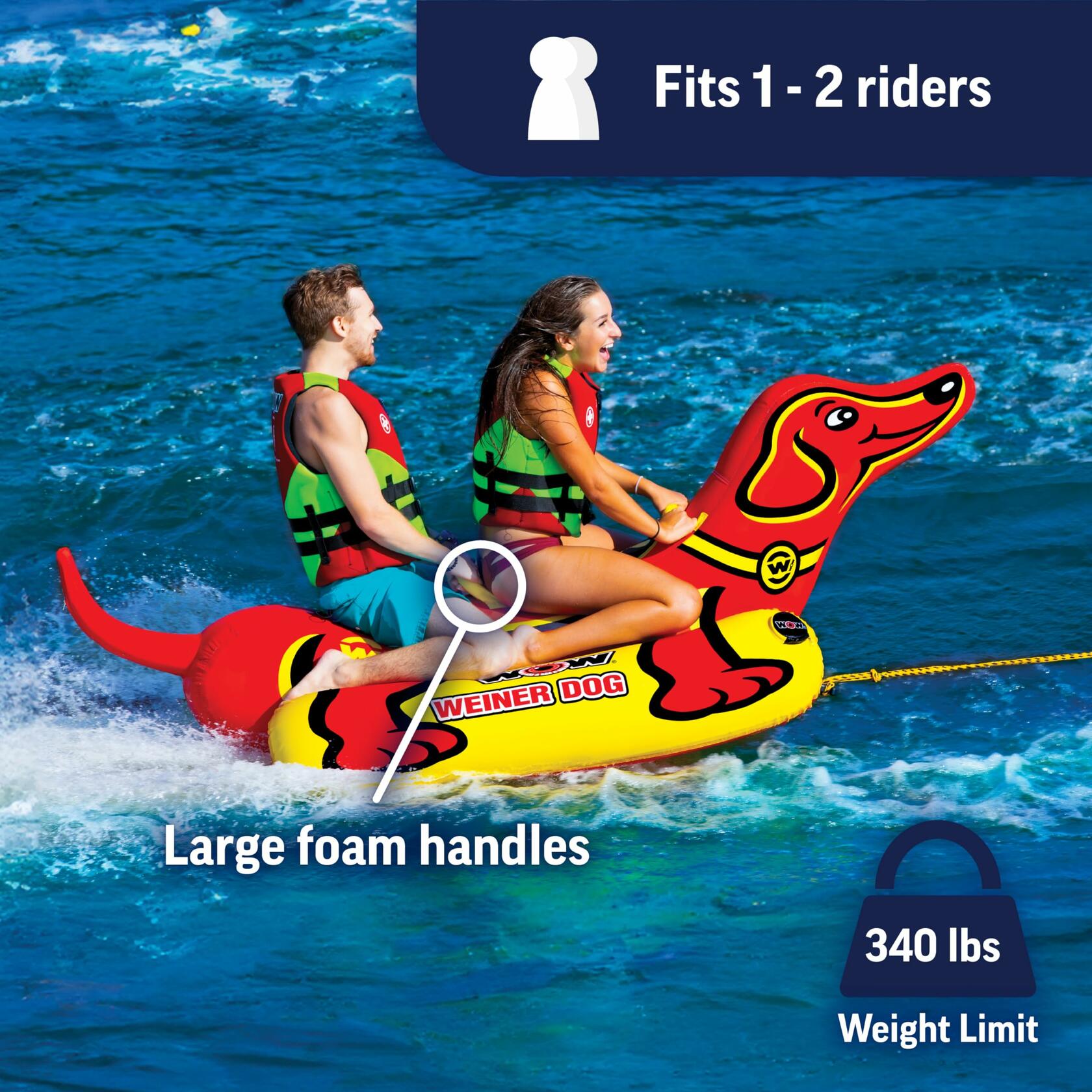 Two people on a red and yellow inflatable dog-shaped tube in the water
