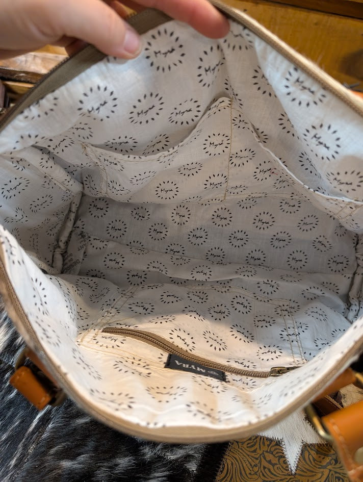 Laredo Hand-Tooled Concealed Carry Bag inside of the purse 