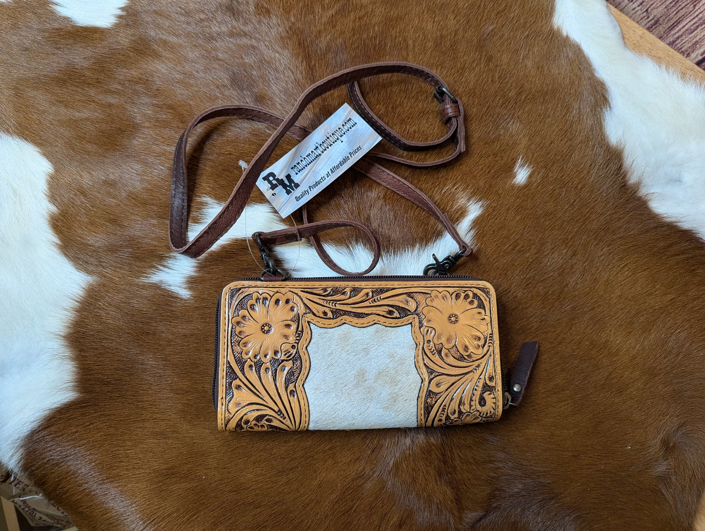 WL Leather crossbody wallet.