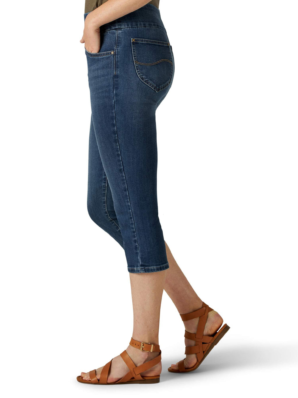 Side view of a lady wearing lee sculpting capri jeans