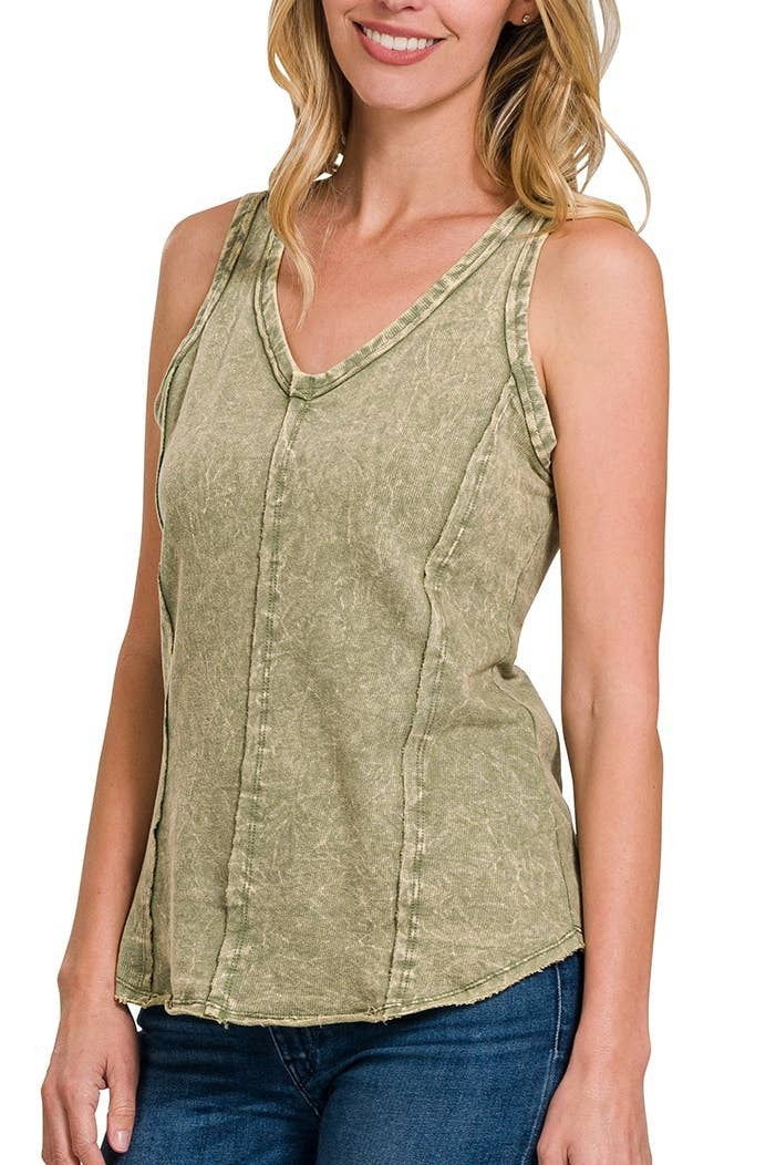 Model wearing relaxed fit cotton top with raw edge detail
