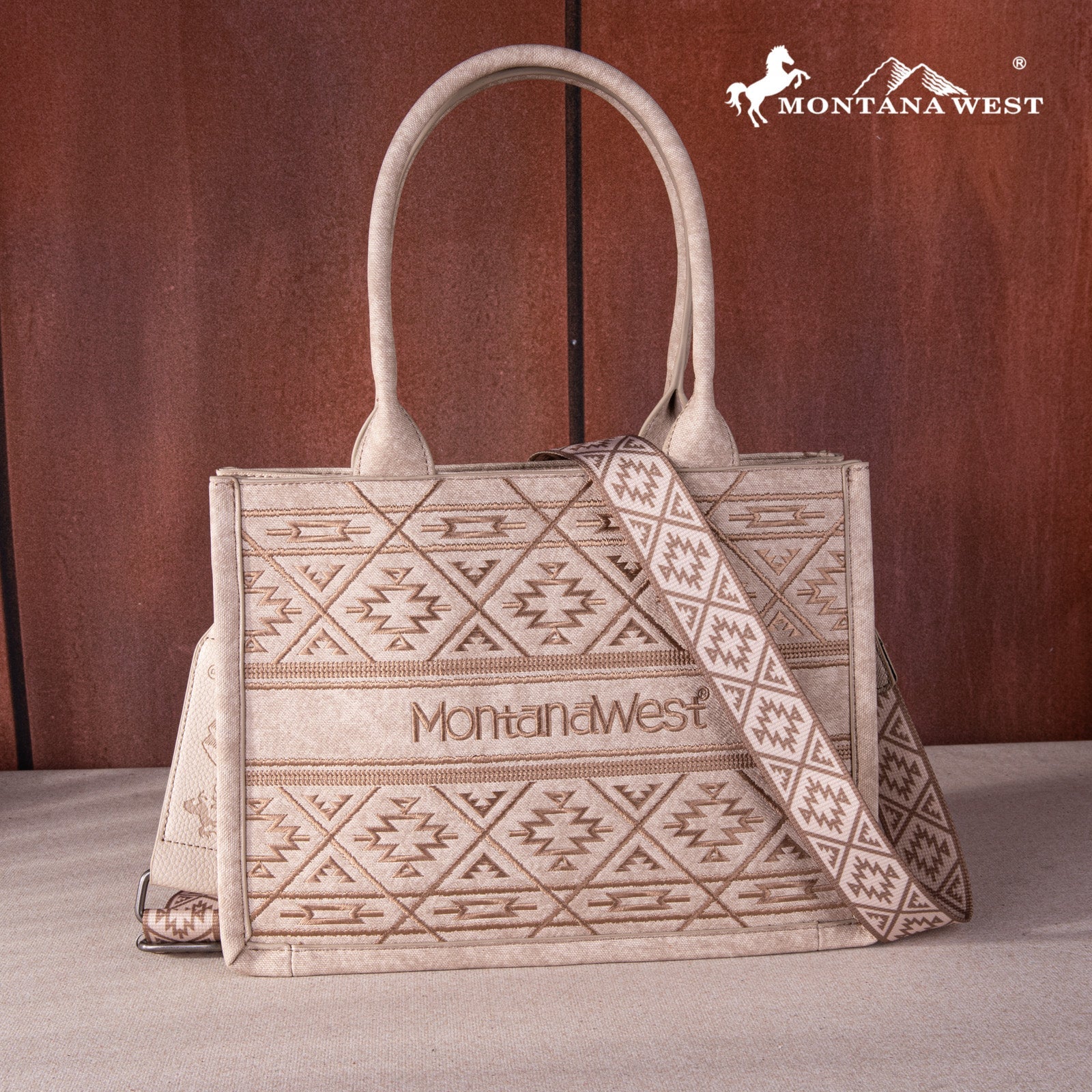 Beige handbag with geometric pattern and 'Montana West' branding on a wooden background