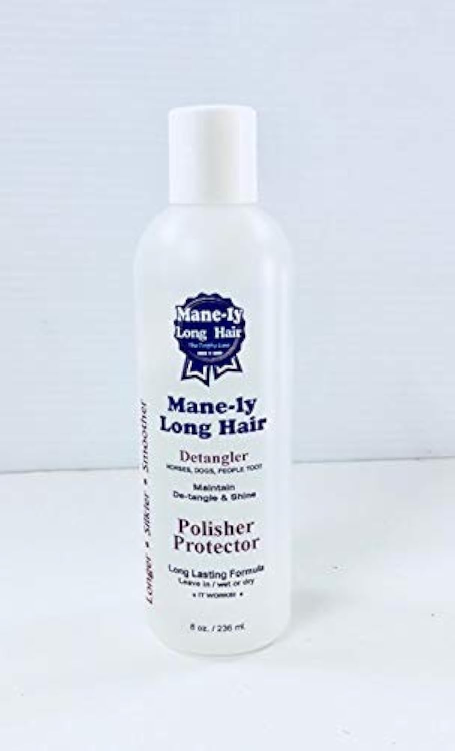 Bottle of Mane-ly Long Hair product on a white background