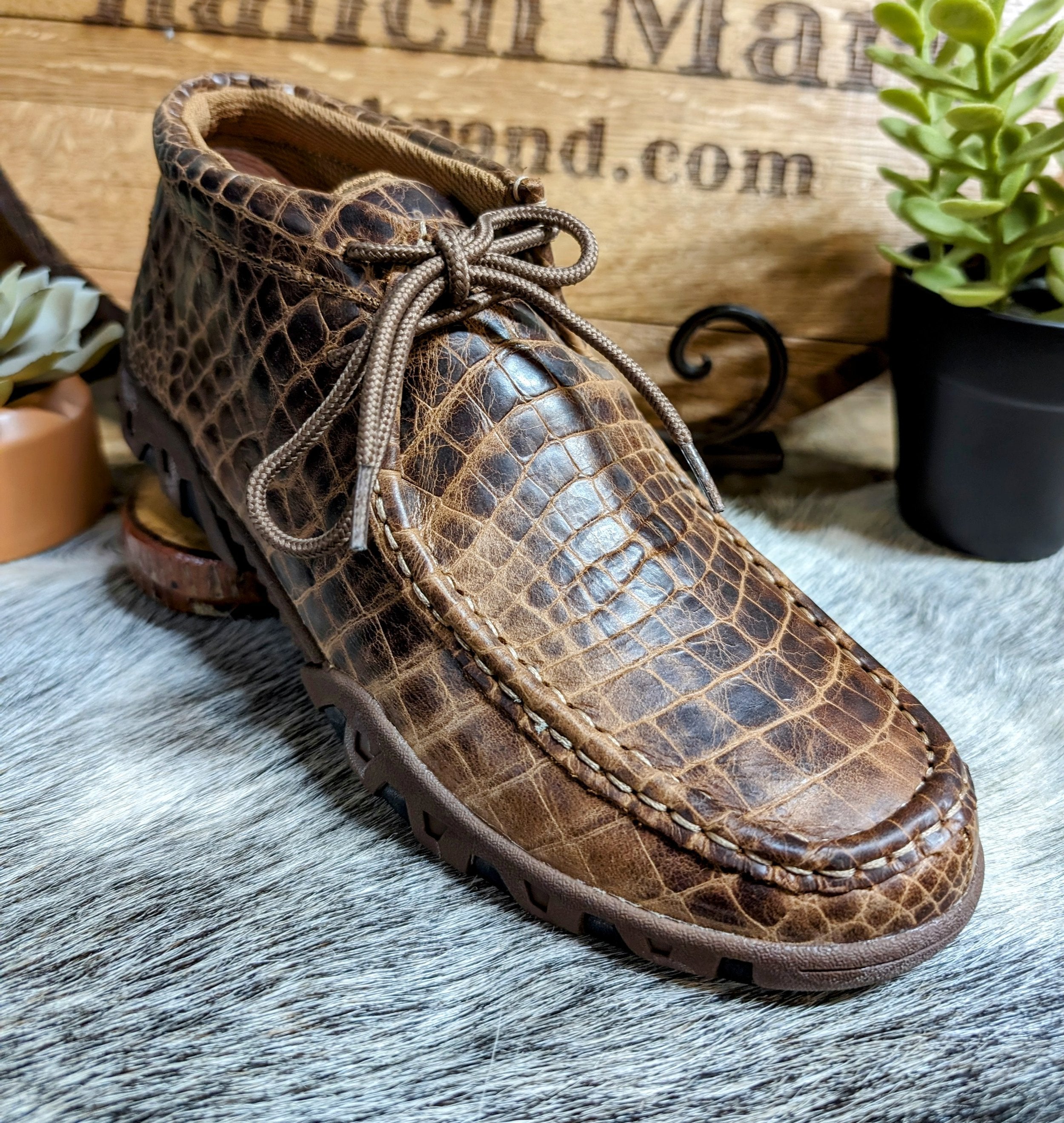 A brown Ferrini men's shoe with an alligator belly cowhide print and lace-up closure.