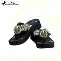 Close-up of oil derrick concho and floral Montana West logo on sole of platform flip flops final clearance
