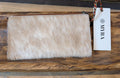 WILDFIRE LEATHER AND HAIRON WALLET on a wood surface
