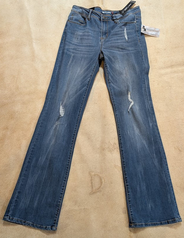 Nine Planet Dark Stone Skinny Jeans on a beige background