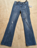 Nine Planet Dark Stone Skinny Jeans on a beige background