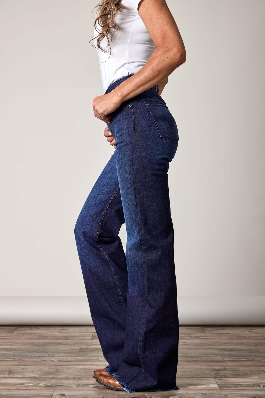 Olivia is a high-rise stovepipe jean with a wide leg and raw hem, making her the perfect everyday jean.