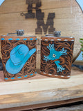 Flask with cowboy hat and cross