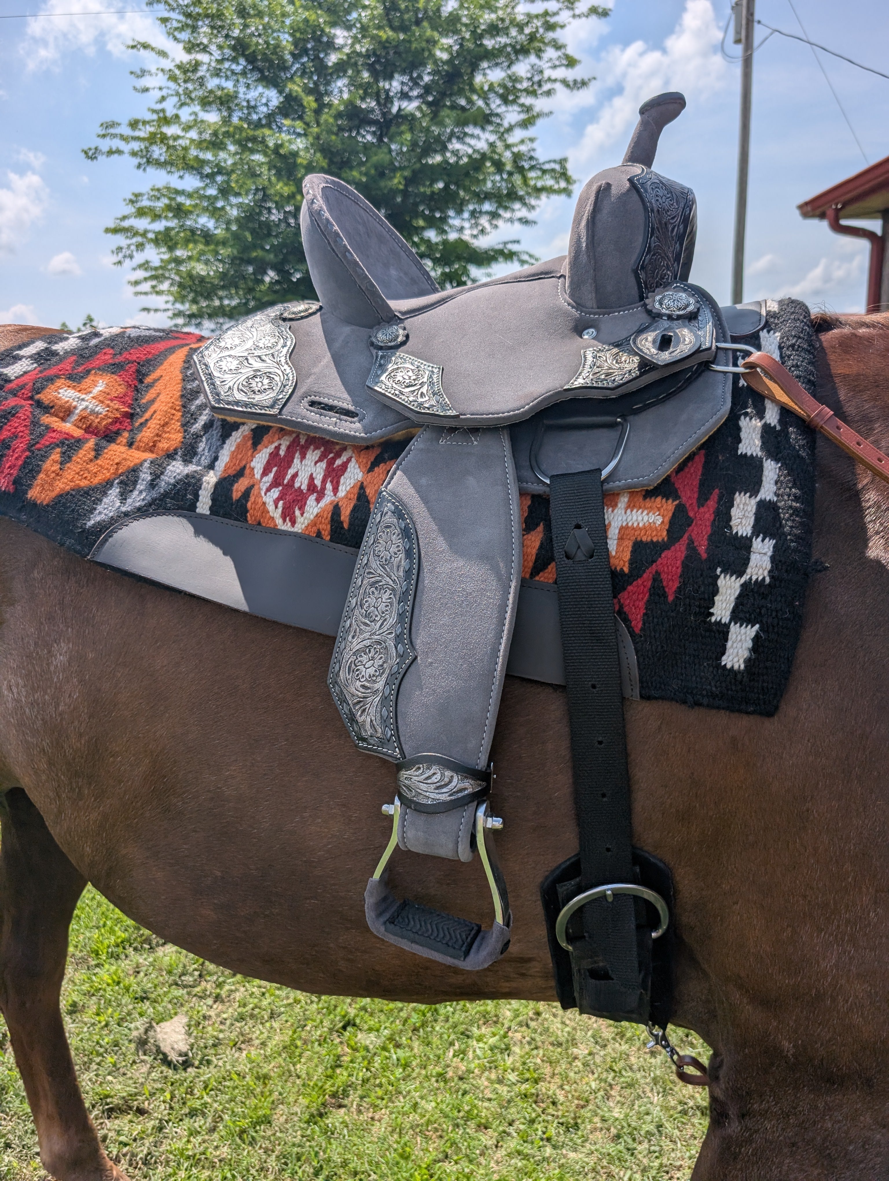Black Royal King Youth barrel saddle, 12-inch seat with deep pommel, contrast stitching, and lightweight design for arena or trail riding