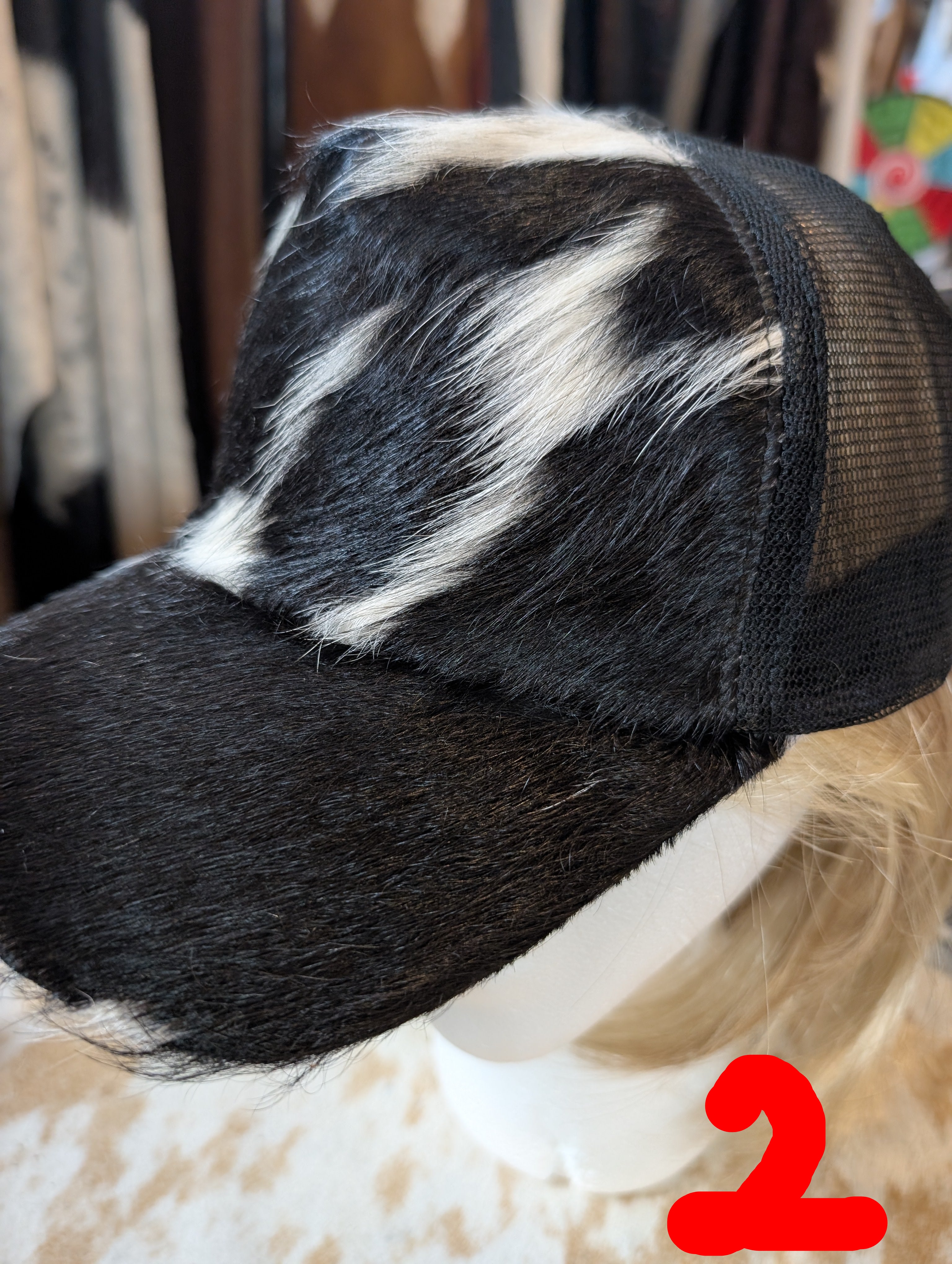 Black and white fur cap on a person with a blurred background