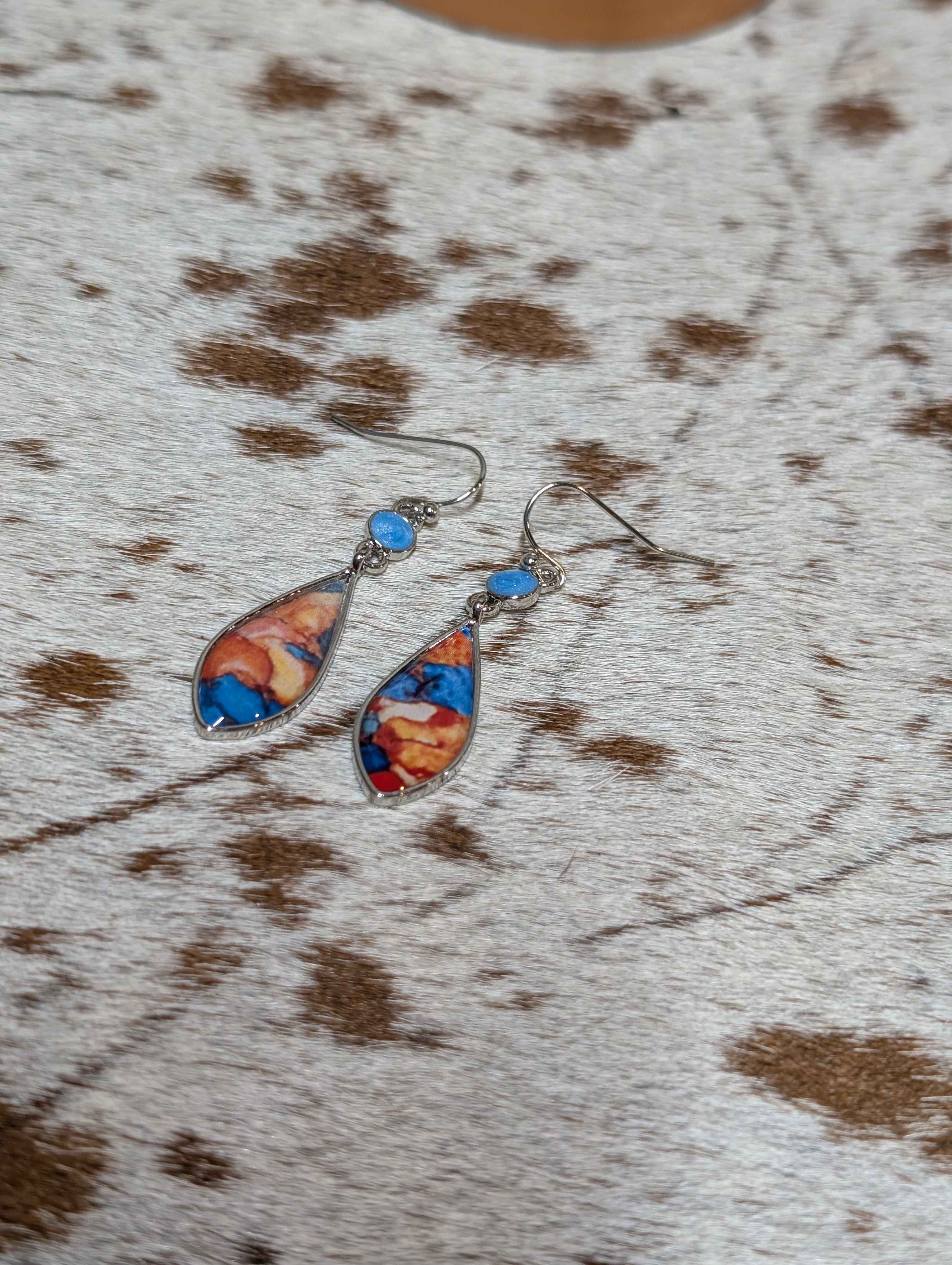 Teardrop stone inlay earrings featuring vibrant blue and orange colors, lightweight western-inspired jewelry
