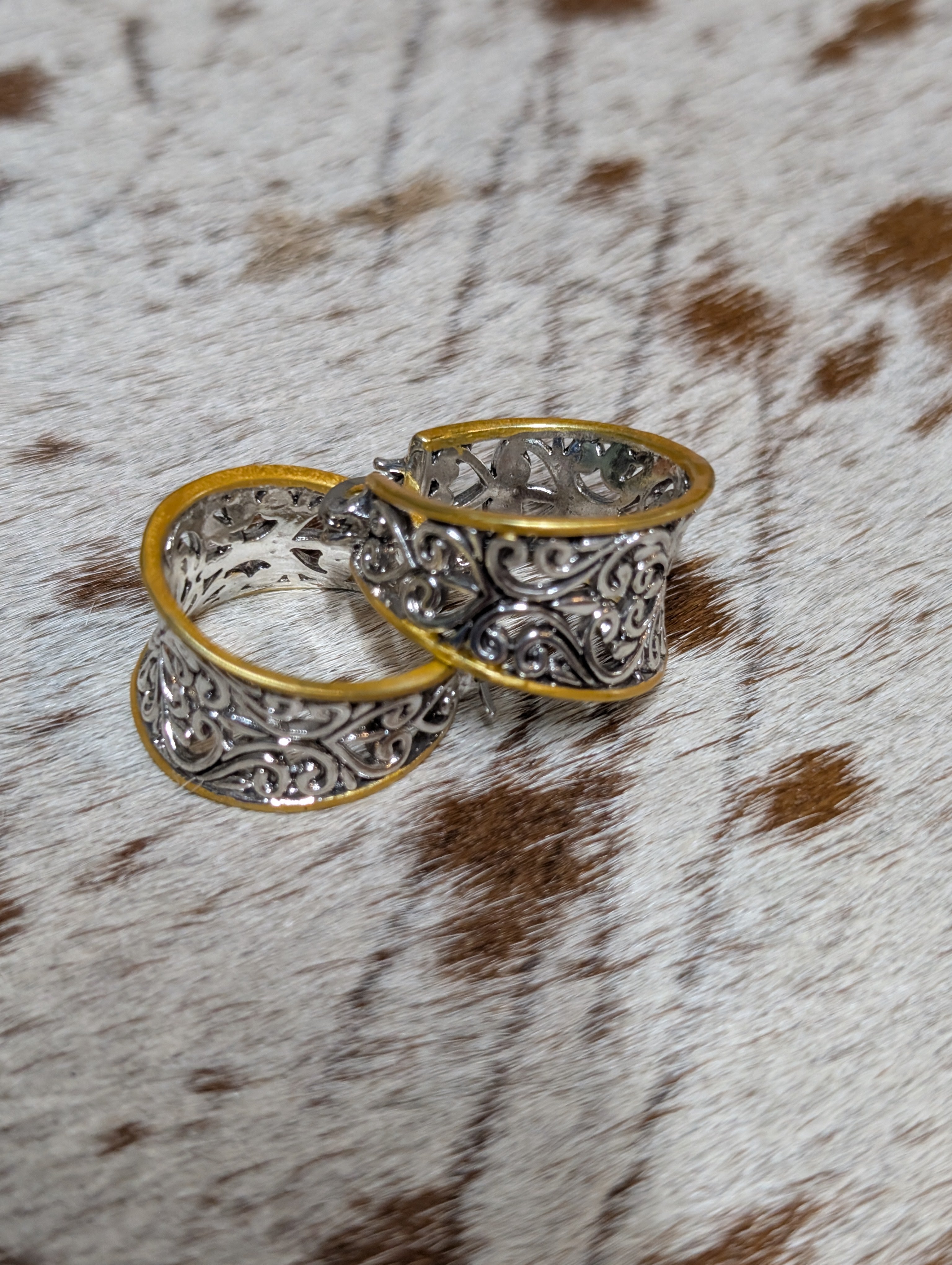 Western fashion hoop earrings with silver filigree scrollwork and gold trim, lightweight western jewelry accessory