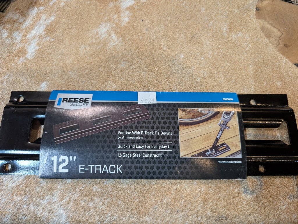 Reese E-Track component on a cardboard background