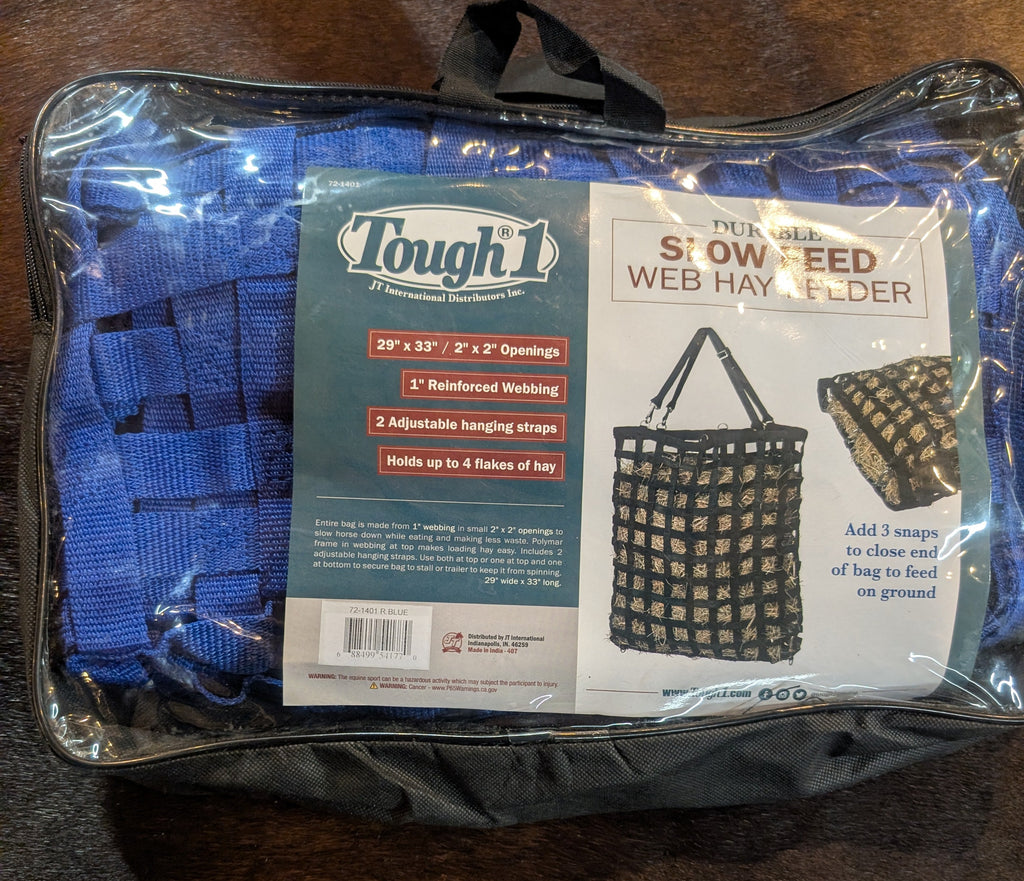 Tough 1 snow feed web hay folder in packaging on a wooden surface