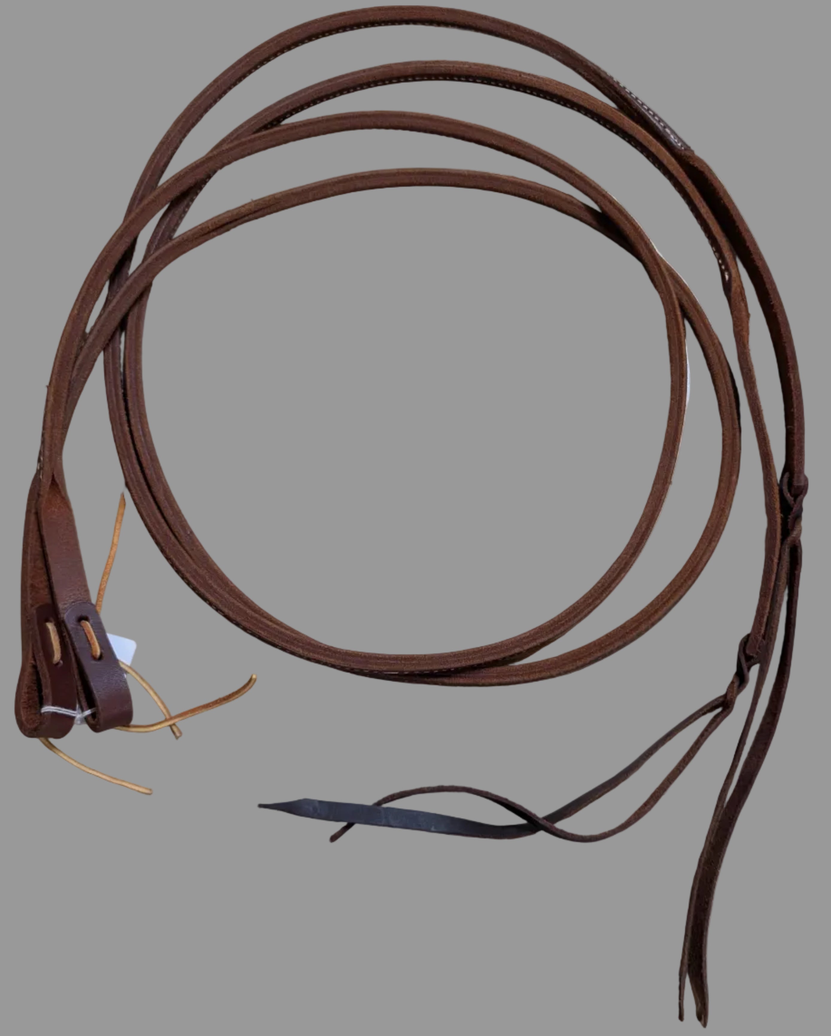 Brown Leather split reins  grey background