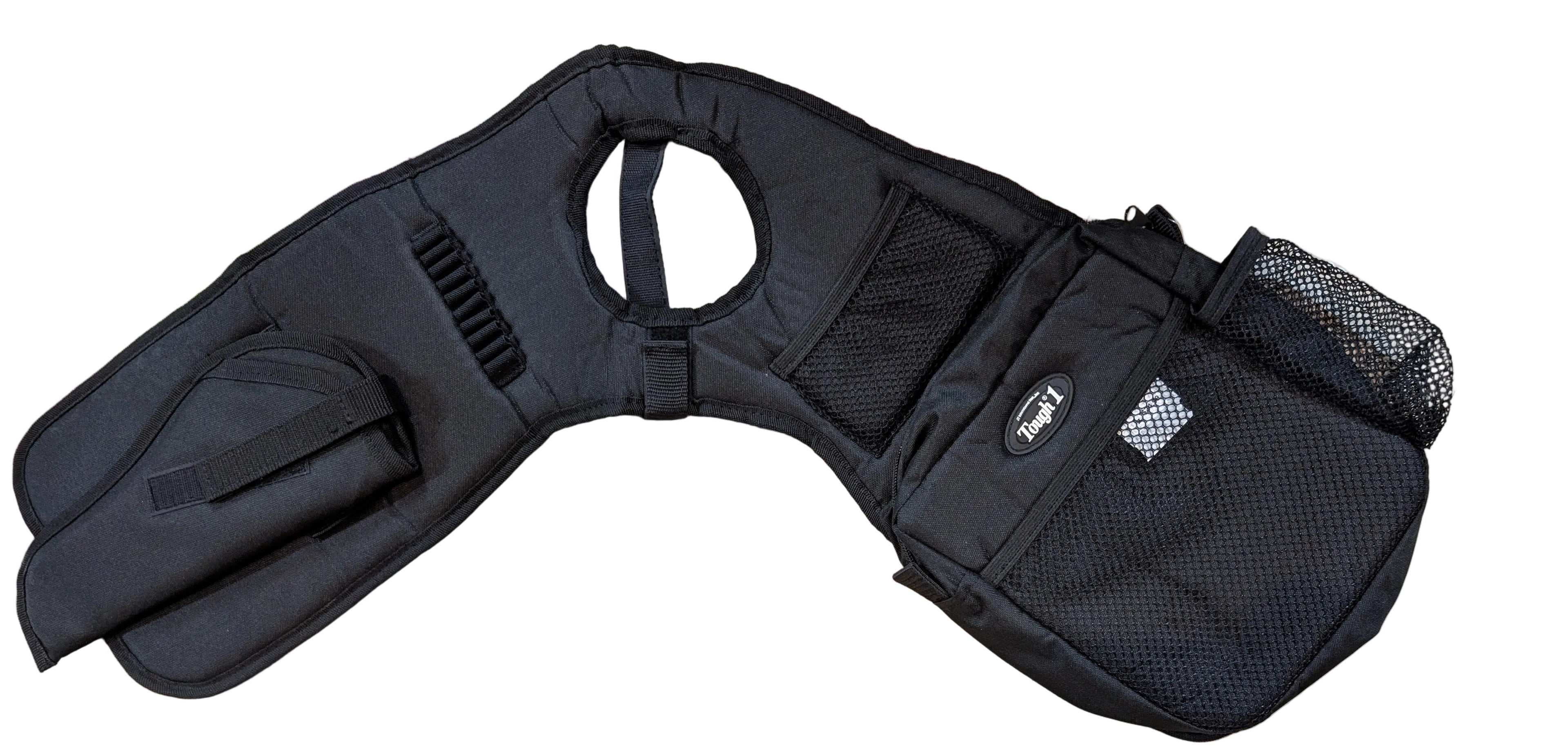 Black protective gear on a beige concrete floor