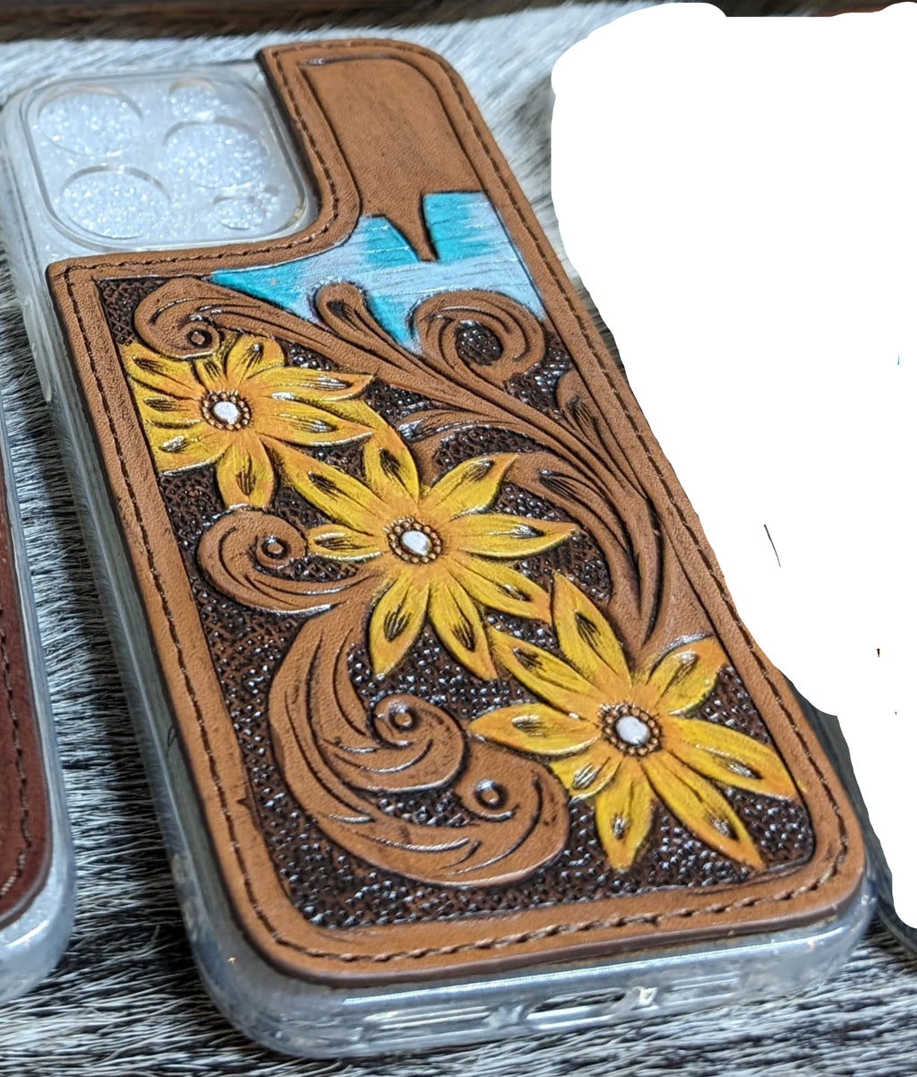 Phone case with floral design and colorful geometric pattern on a textured surface