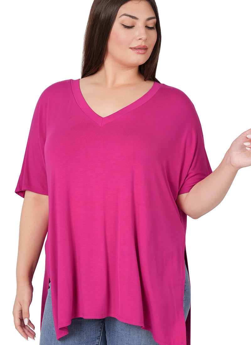 Woman Wearing a V neck Side slit top with a white background