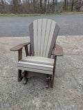 Barrel back Poly outdoor gliding chair.