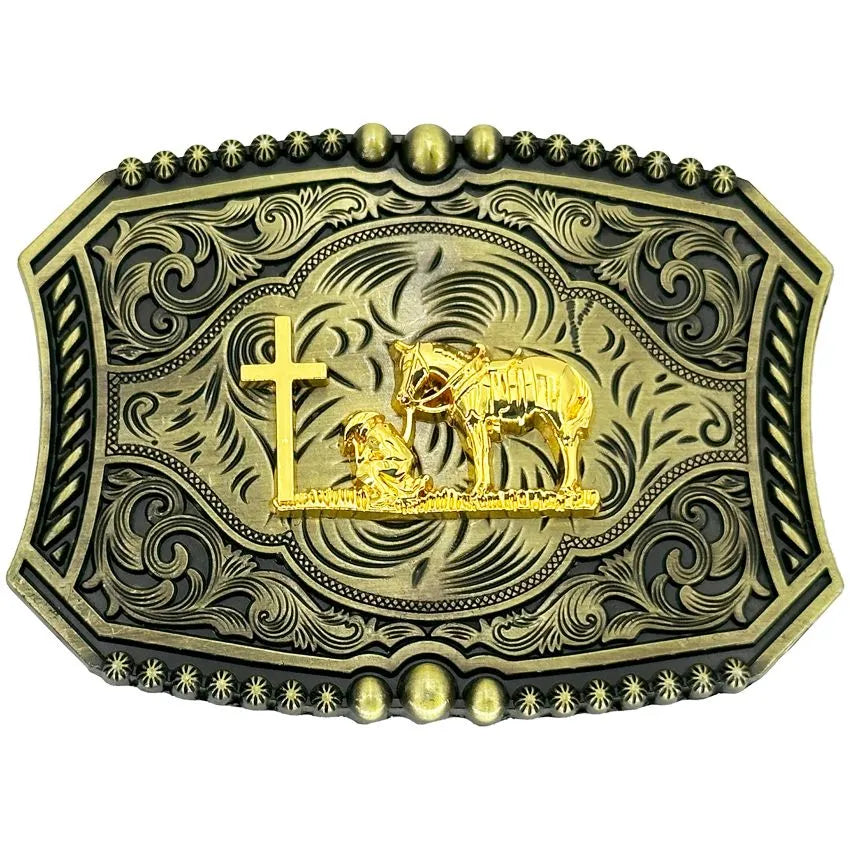 Two-tone Western belt buckle featuring a gold praying cowboy, horse, and cross emblem centered on a antique bronze floral scrollwork background with star accent studs.