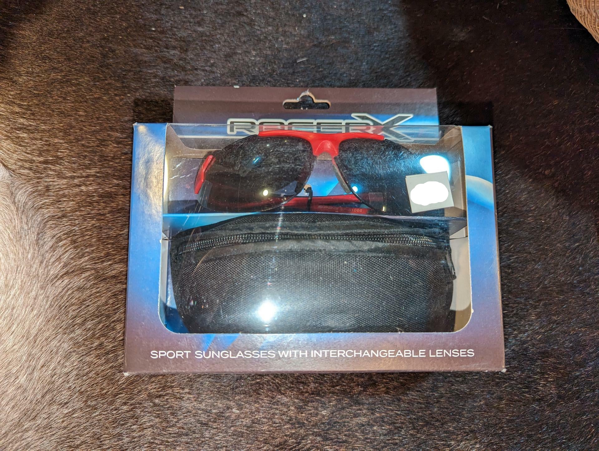 Race RX sport sunglasses with interchangeable lenses and black carrying case