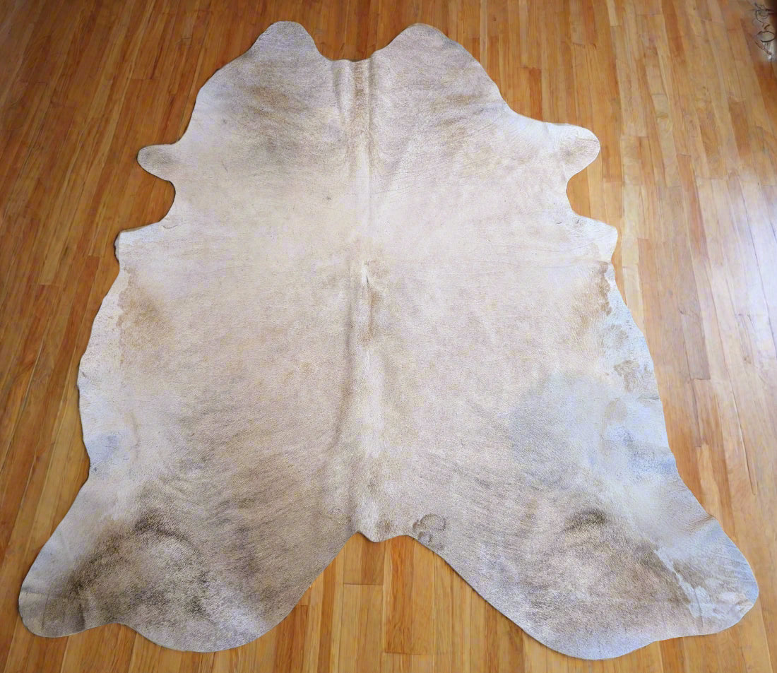Grade A genuine cowhide rug in light blonde color, perfect for rustic décor