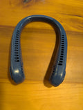 Navy blue rechargeable hands-free portable neck fan with 360 degree air vents.