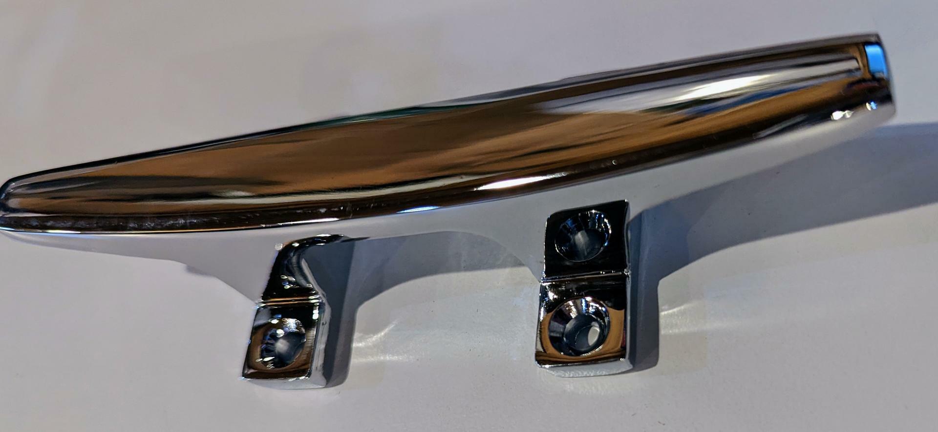 Chrome boat rail with two mounting brackets on a white background