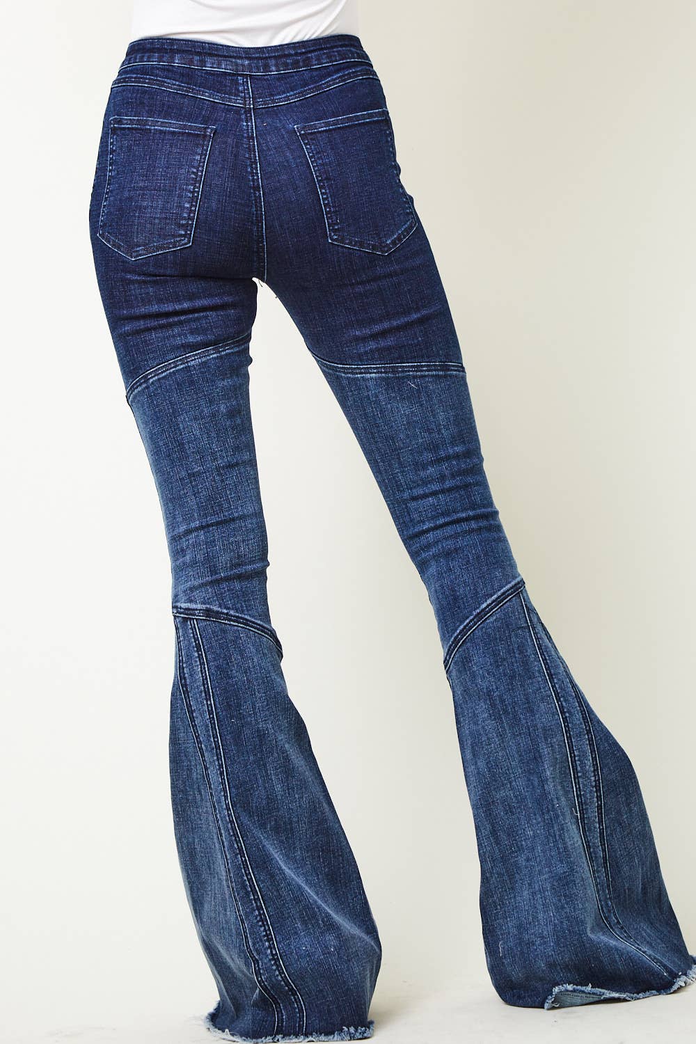 Back view of Western ombre denim pants showing flattering fit and panel design