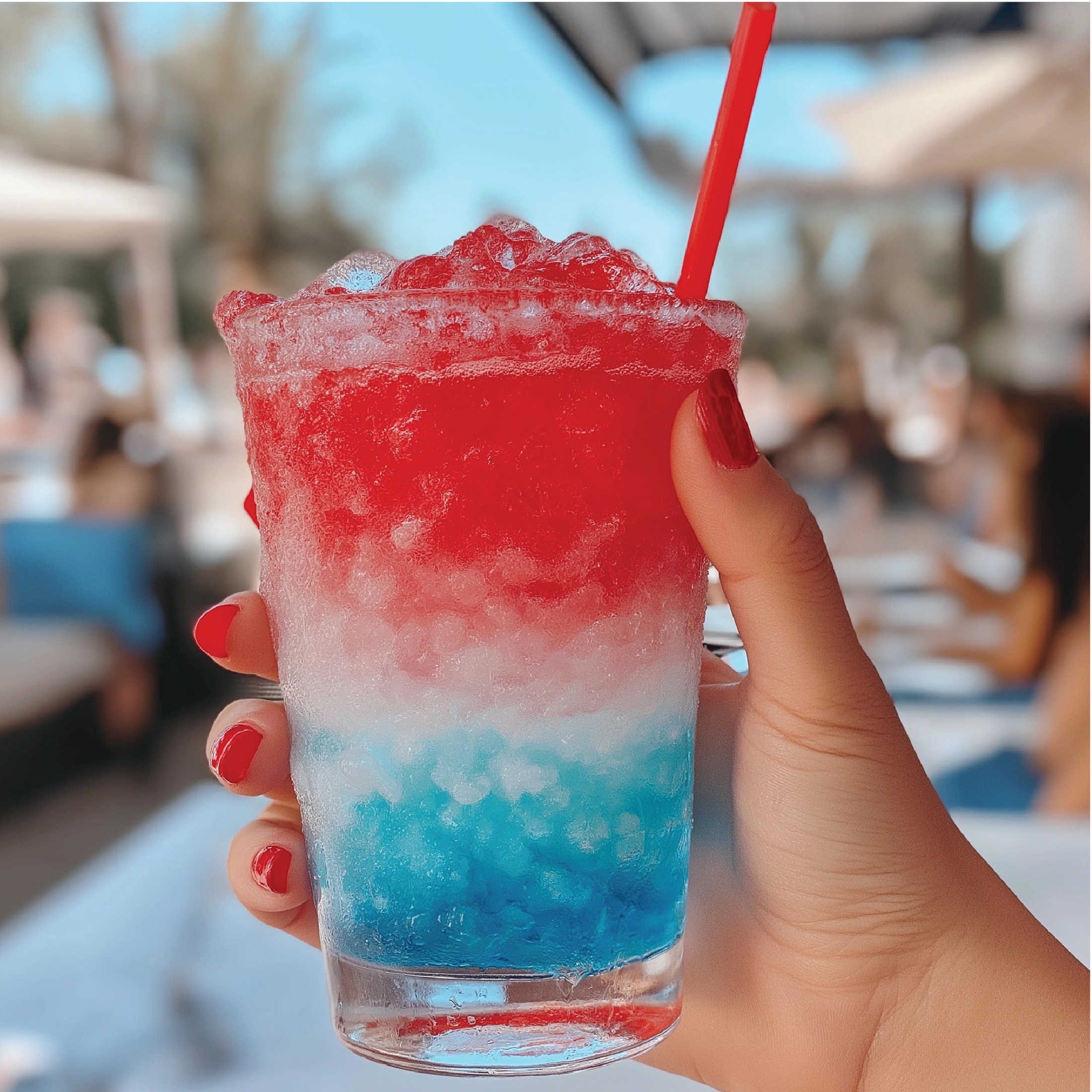 Close-up of Rocket Pop label featuring red cherry, blue raspberry, and lime visuals.