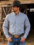 Western shirt shown in the blue color on a cowboy