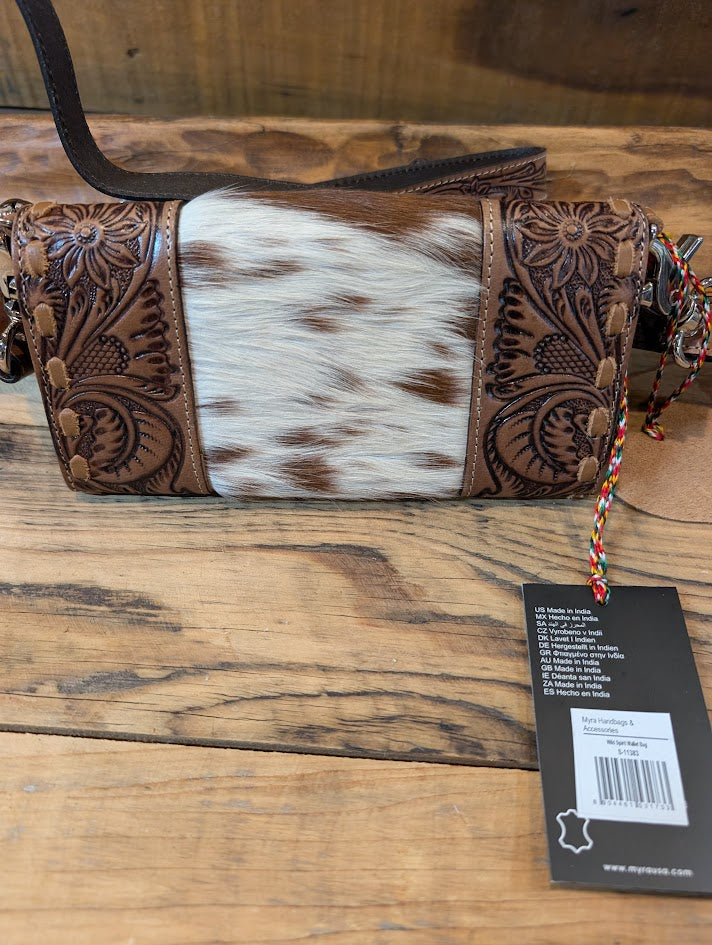 Myra Wild Spirit wallet on a wood surface