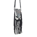 Black and white patterned bag with fringes on a white background