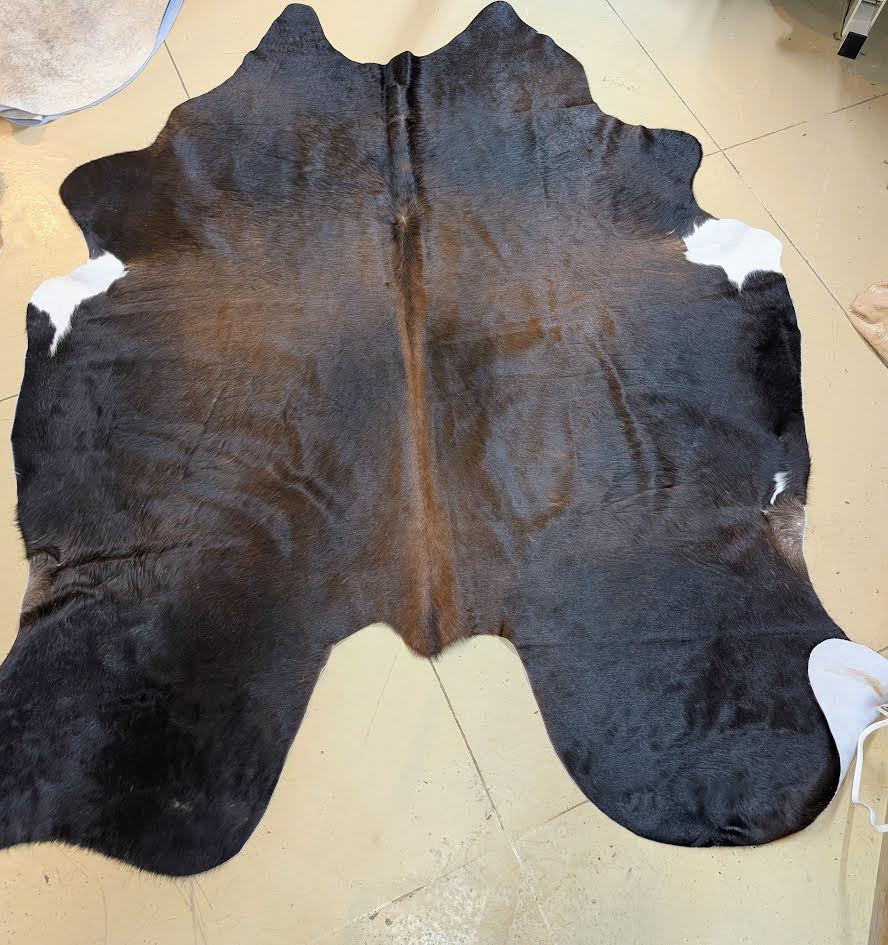 Black and white cowhide rug 